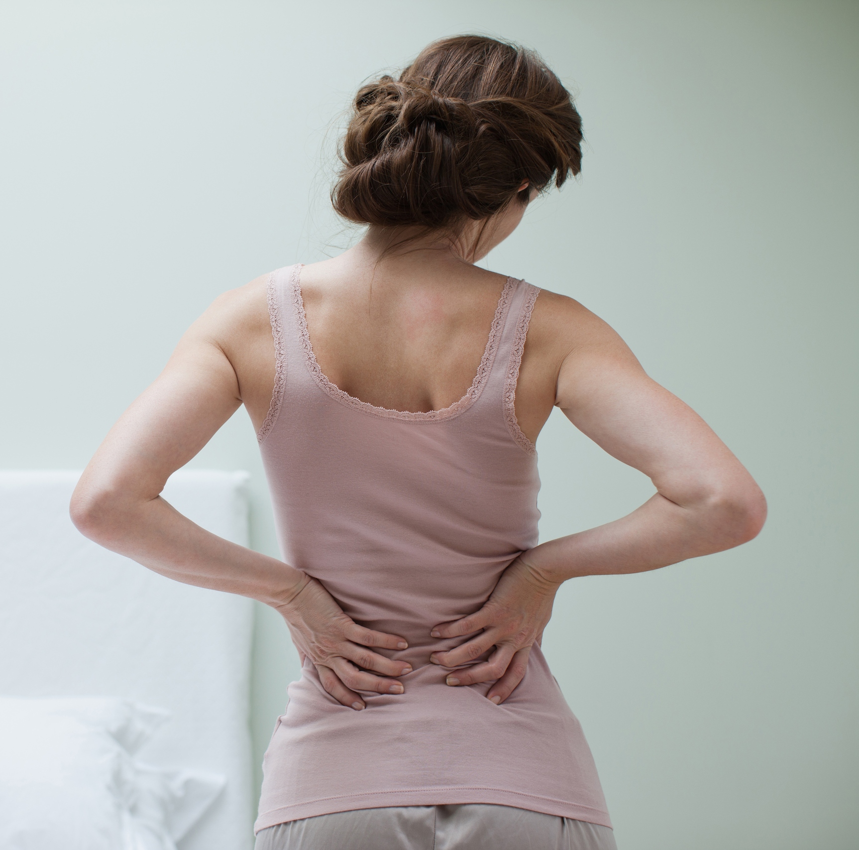 Болит поястница